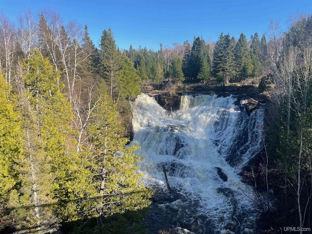 6856 Five Mile Point Rd, Allouez, MI 49805 - water view featuring a heavily wooded area