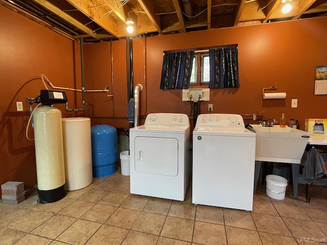 6856 Five Mile Point Rd, Allouez, MI 49805 - laundry room with washing machine and dryer and tile patterned flooring