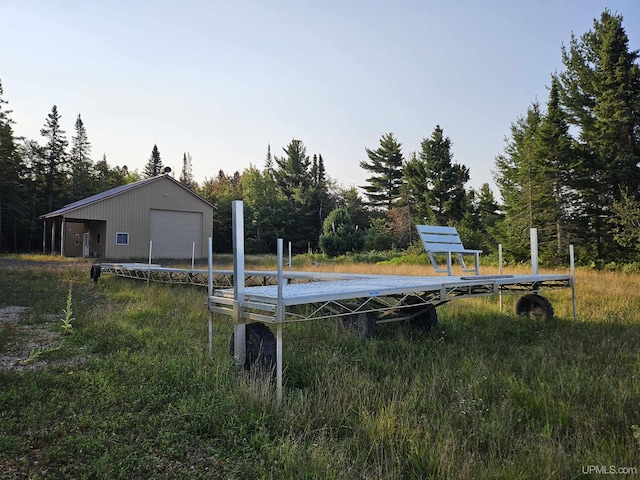 51993 Rice Lake Rd, Lake Linden, MI 49945 - view of yard with a detached garage and an outdoor structure