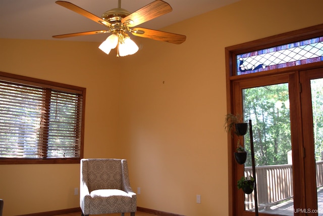 1001 Spruce St, Houghton, MI 49931 - living area featuring ceiling fan and baseboards