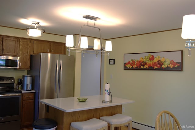 1001 Spruce St, Houghton, MI 49931 - kitchen featuring stainless steel appliances, brown cabinetry, light countertops, a kitchen island, and a breakfast bar