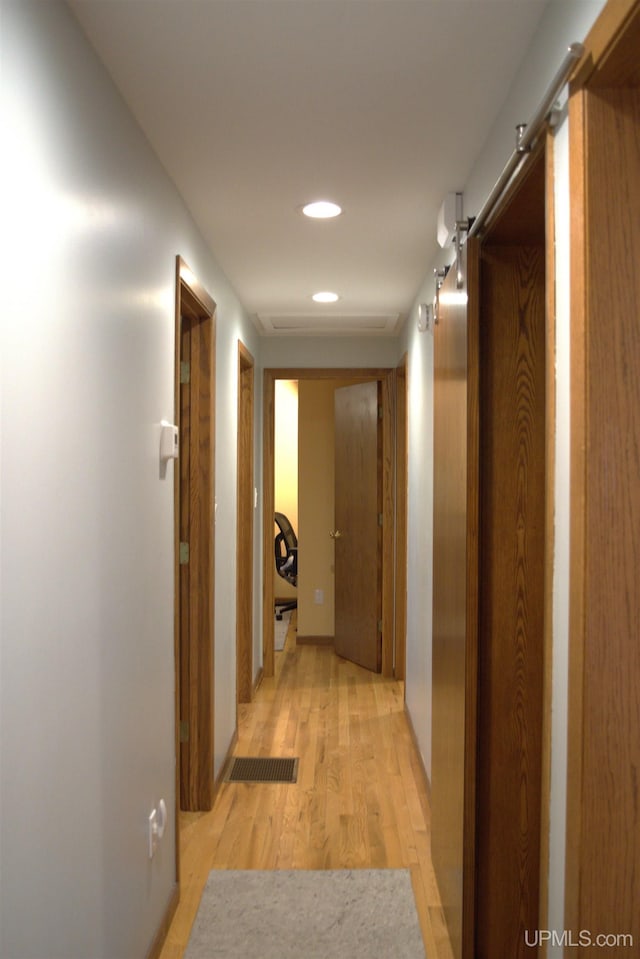 1001 Spruce St, Houghton, MI 49931 - corridor featuring recessed lighting and light wood-style floors