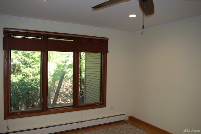 1001 Spruce St, Houghton, MI 49931 - unfurnished room with a baseboard radiator, ceiling fan, wood finished floors, ornamental molding, and baseboards
