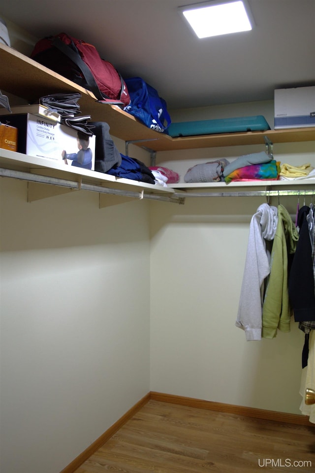 1001 Spruce St, Houghton, MI 49931 - walk in closet with wood finished floors