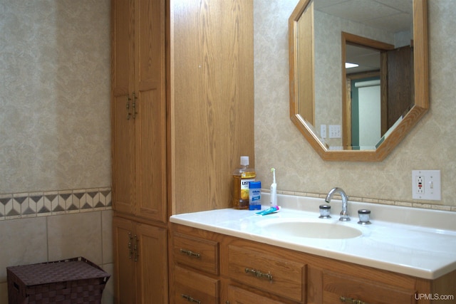 1001 Spruce St, Houghton, MI 49931 - bathroom with wallpapered walls and vanity