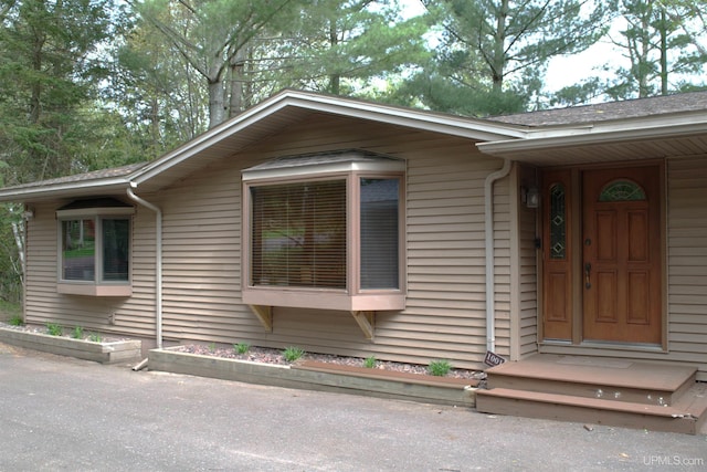 1001 Spruce St, Houghton, MI 49931 - view of front of home with a shingled roof