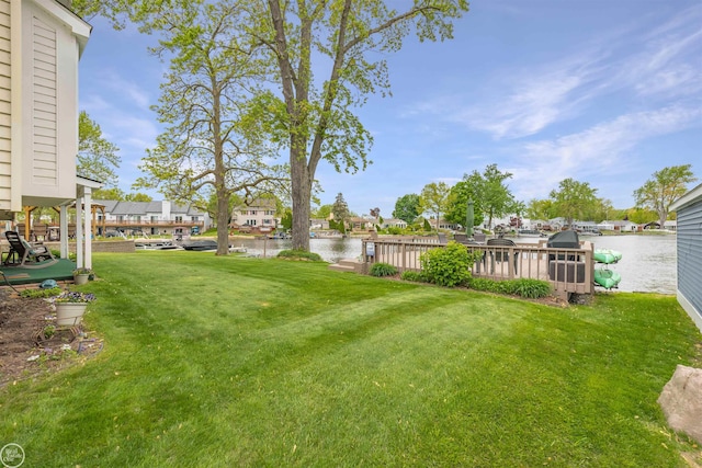 8878 Arlington Rd, White Lake, MI 48386 - view of grassy yard with a water view and a residential view