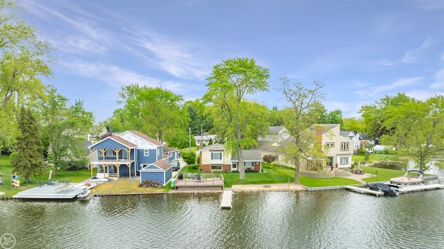 8878 Arlington Rd, White Lake, MI 48386 - dock featuring a water view, a yard, and a residential view