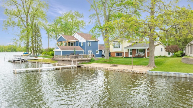 8878 Arlington Rd, White Lake, MI 48386 - rear view of property featuring a water view and a lawn