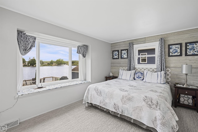 8878 Arlington Rd, White Lake, MI 48386 - bedroom featuring carpet, baseboards, a water view, and crown molding