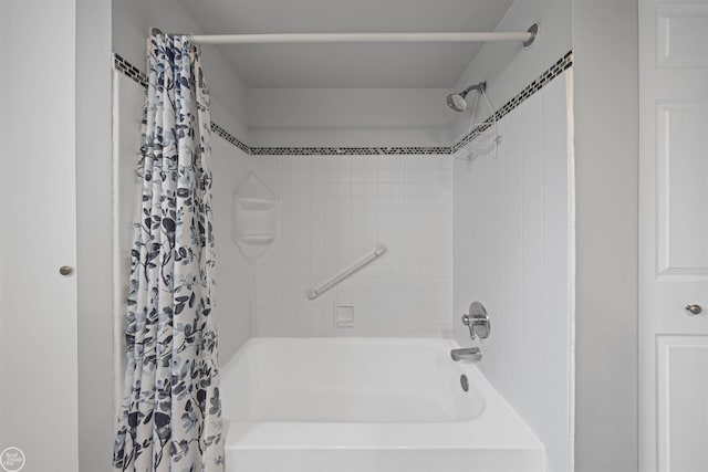 8878 Arlington Rd, White Lake, MI 48386 - bathroom featuring shower / tub combo with curtain