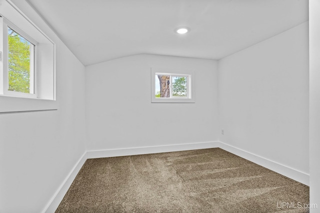 49058 Douglas St, Hancock, MI 49930 - carpeted empty room with baseboards, lofted ceiling, and recessed lighting