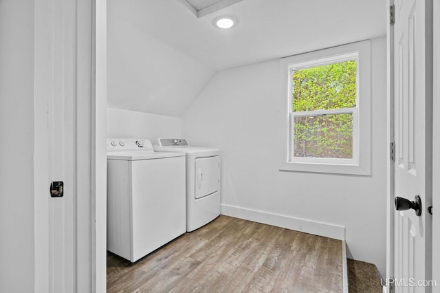 49058 Douglas St, Hancock, MI 49930 - laundry room with independent washer and dryer, light wood finished floors, and baseboards