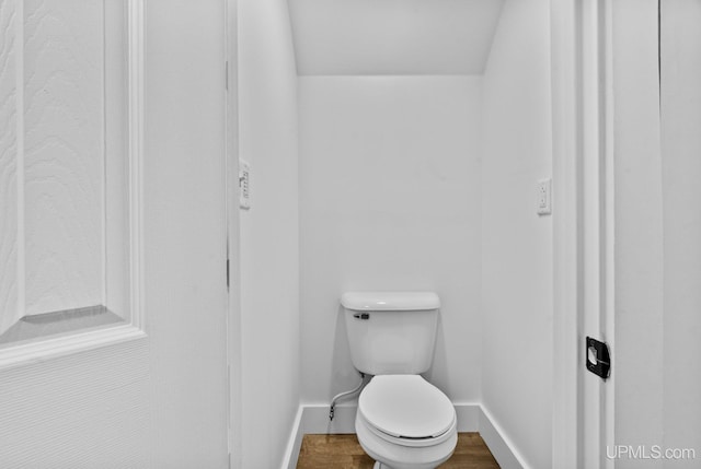 49058 Douglas St, Hancock, MI 49930 - bathroom featuring baseboards and toilet