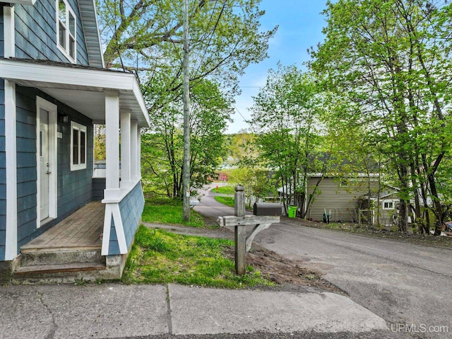 49058 Douglas St, Hancock, MI 49930 - view of yard with a porch