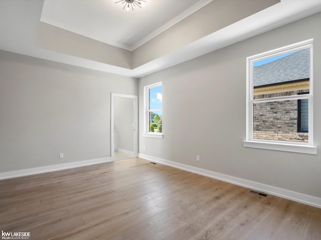 55127 Saint Paul Dr, Macomb Twp, MI 48042 - unfurnished room with ornamental molding, light wood-type flooring, and baseboards