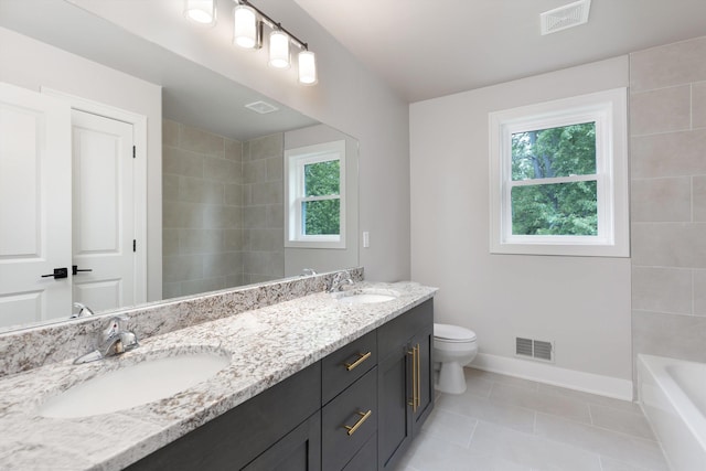 29126 Brooke Meadows Ct, Chesterfield, MI 48047 - full bathroom with double vanity, baseboards, toilet, and tile patterned floors