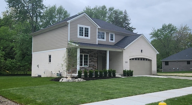 29126 Brooke Meadows Ct, Chesterfield, MI 48047 - view of front of property with concrete driveway, a front lawn, brick siding, an attached garage, and covered porch