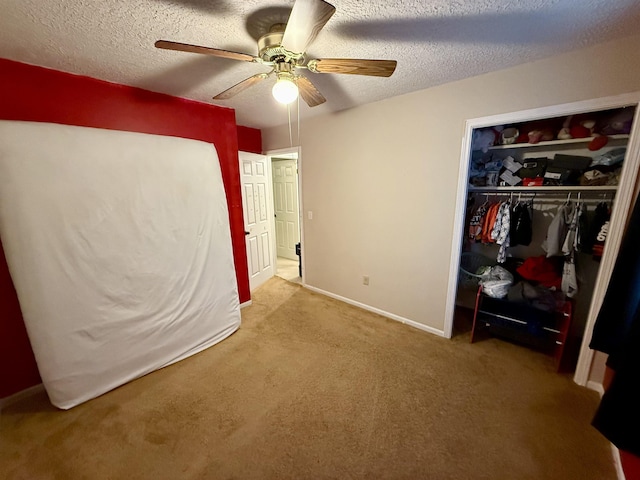 2222 Compton St, Saginaw, MI 48602 - unfurnished bedroom featuring a closet, carpet, a textured ceiling, ceiling fan, and baseboards
