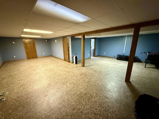2222 Compton St, Saginaw, MI 48602 - finished below grade area with a drop ceiling, carpet flooring, and baseboards