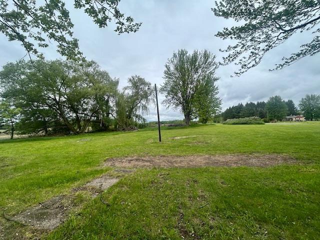 4992 Freeman Rd, Beaverton, MI 48612 - surrounding community with a lawn
