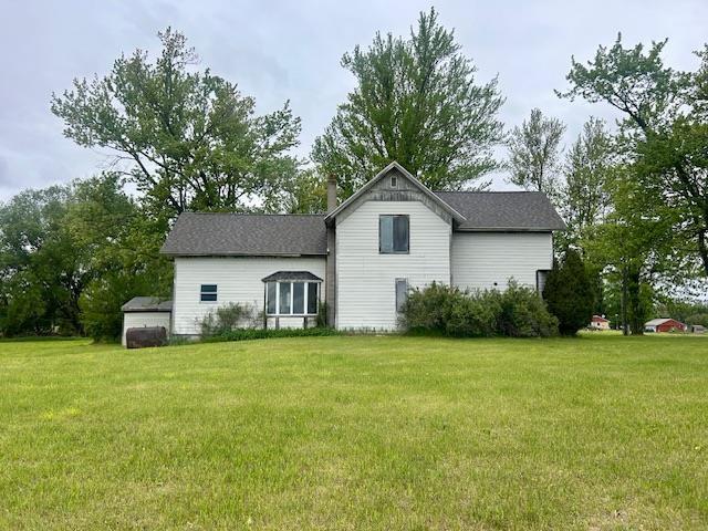 4992 Freeman Rd, Beaverton, MI 48612 - view of front facade featuring a front lawn