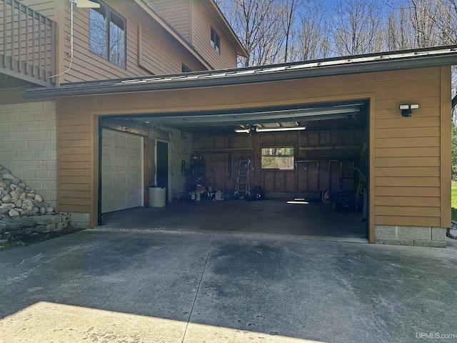 7730 Tipperary Ave, Gladstone, MI 49837 - garage featuring concrete driveway