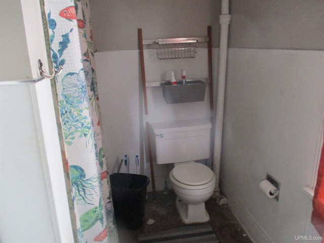 405 W S Ave Unit 1, Houghton, MI 49931 - bathroom featuring toilet and a shower with shower curtain