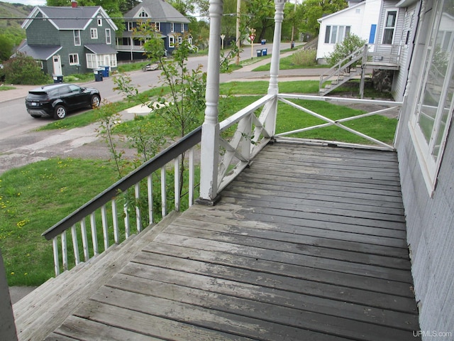 405 W S Ave Unit 1, Houghton, MI 49931 - wooden terrace featuring a residential view