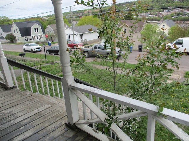 405 W S Ave Unit 1, Houghton, MI 49931 - porch featuring a residential view