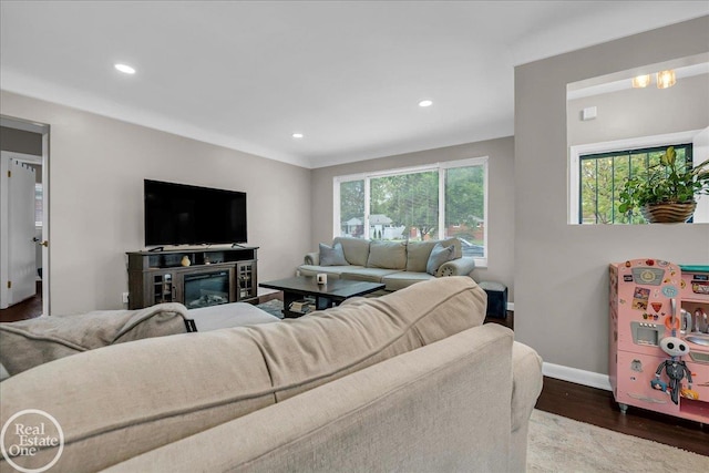 24080 Scotia Rd, Oak Park, MI 48237 - living area featuring dark wood finished floors, recessed lighting, and baseboards