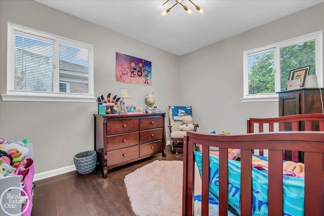 24080 Scotia Rd, Oak Park, MI 48237 - bedroom featuring baseboards and wood finished floors