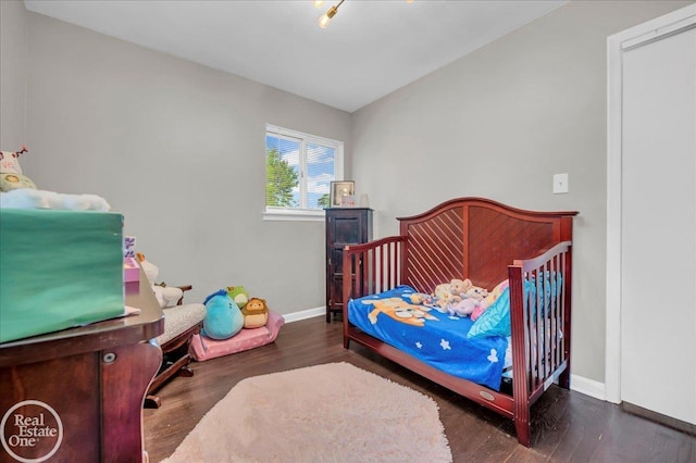 24080 Scotia Rd, Oak Park, MI 48237 - bedroom with baseboards and wood finished floors