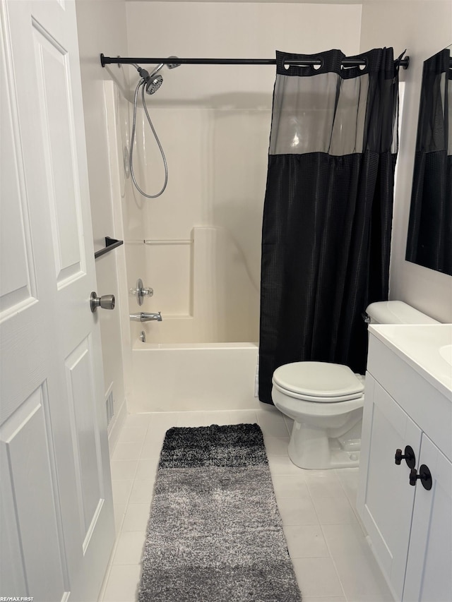 16180 Scenic Dr, Clinton, MI 48038 - full bathroom with tile patterned floors, toilet, vanity, and shower / bath combo
