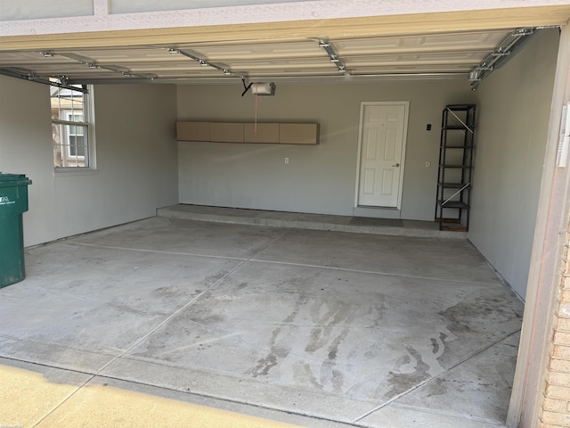 16180 Scenic Dr, Clinton, MI 48038 - garage with a garage door opener