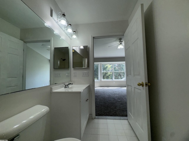16180 Scenic Dr, Clinton, MI 48038 - bathroom with vanity, a ceiling fan, tile patterned floors, and toilet