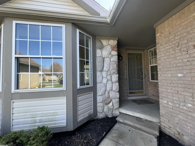 16180 Scenic Dr, Clinton, MI 48038 - property entrance featuring stone siding and brick siding