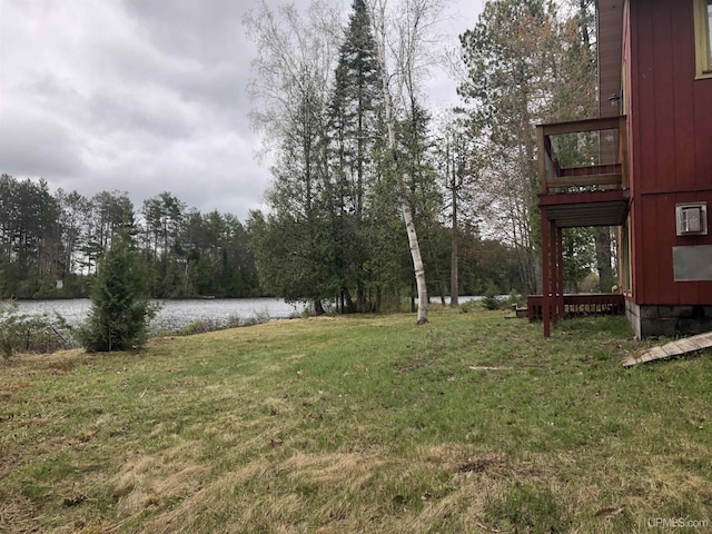 510 S Mackinac Ln, Gwinn, MI 49841 - view of green lawn featuring a water view