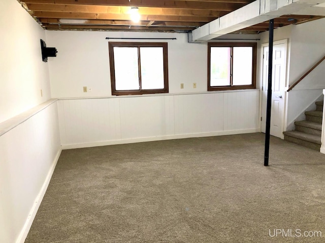 510 S Mackinac Ln, Gwinn, MI 49841 - basement featuring stairs, carpet floors, and a wainscoted wall
