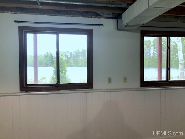 510 S Mackinac Ln, Gwinn, MI 49841 - spare room featuring a wainscoted wall