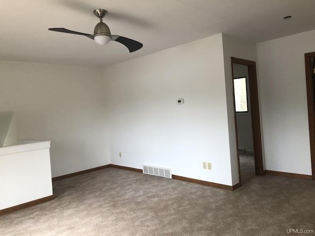 510 S Mackinac Ln, Gwinn, MI 49841 - carpeted spare room with ceiling fan and baseboards