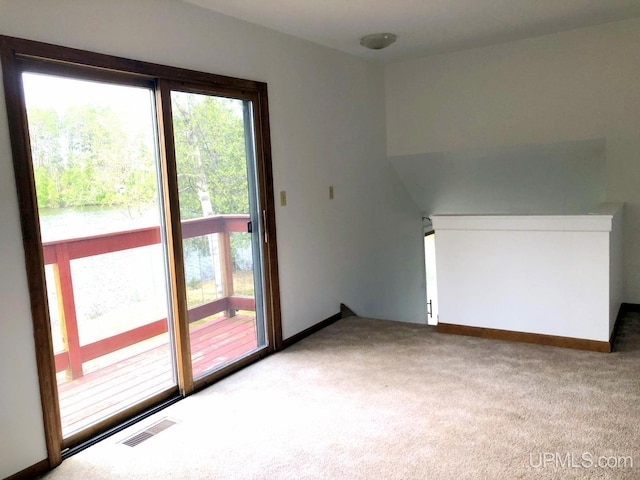 510 S Mackinac Ln, Gwinn, MI 49841 - unfurnished room featuring healthy amount of natural light, carpet, and baseboards