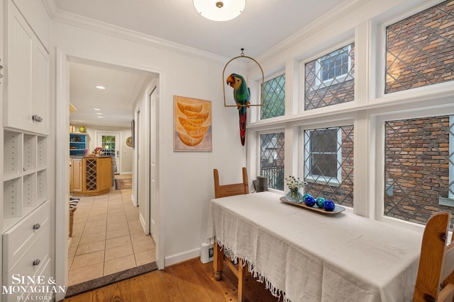 255 Lewiston Rd, Grosse Pointe Farms, MI 48236 - dining room with light wood-style floors, baseboards, and ornamental molding