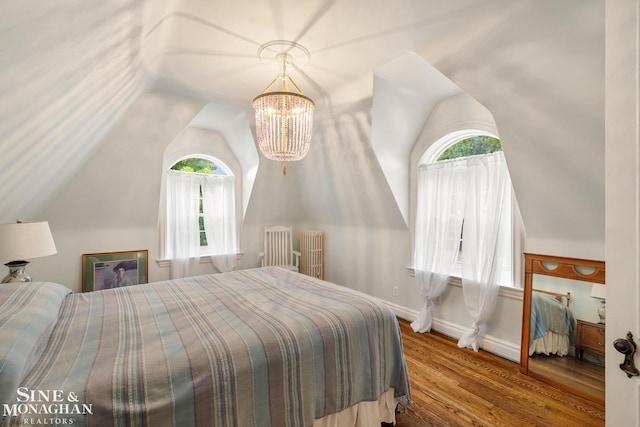 255 Lewiston Rd, Grosse Pointe Farms, MI 48236 - bedroom featuring a chandelier, wood finished floors, vaulted ceiling, and baseboards