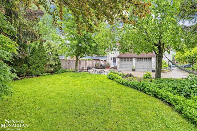 255 Lewiston Rd, Grosse Pointe Farms, MI 48236 - view of yard featuring a garage
