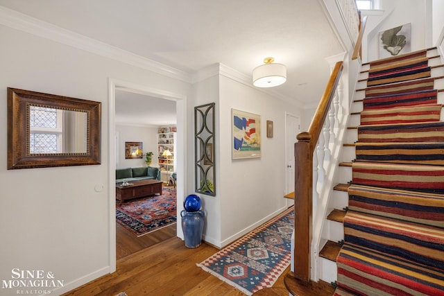 255 Lewiston Rd, Grosse Pointe Farms, MI 48236 - staircase with hardwood / wood-style floors, baseboards, and crown molding