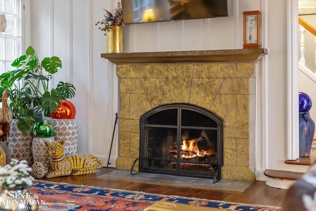 255 Lewiston Rd, Grosse Pointe Farms, MI 48236 - detailed view of a tiled fireplace and wood finished floors