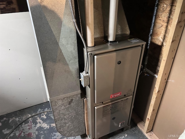 249 E Michigan Ave, Ironwood, MI 49938 - utility room with heating unit