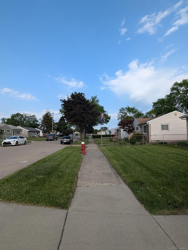 13610 Gander Ave, Warren, MI 48088 - view of asphalt street with sidewalks and a residential view