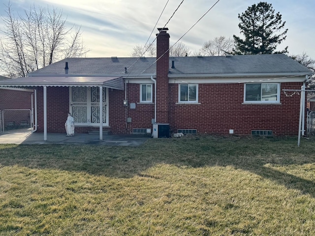 28724 Sutherland Dr, Warren, MI 48088 - rear view of house with brick siding, a chimney, a patio, central air condition unit, and roof with shingles